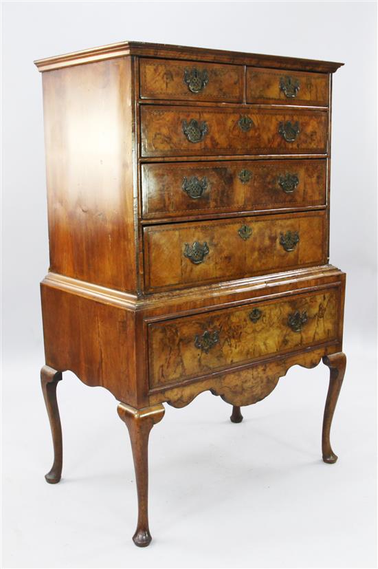 A George II walnut chest on stand, W.3ft D.1ft 10in. H.4ft 8in.